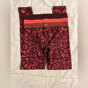 Athleta pink and maroon leopard print tights